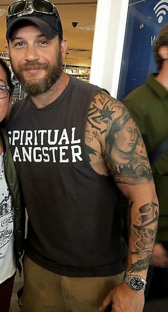 Tom Hardy tattoo "portrait of Madonna cradling a baby holds"