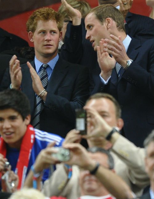 Prince Harry and Prince William at the Algeria v England match in 2010