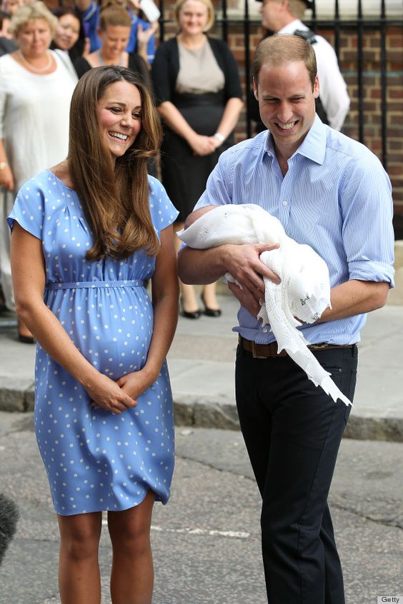 Kate and William show off their first son, George