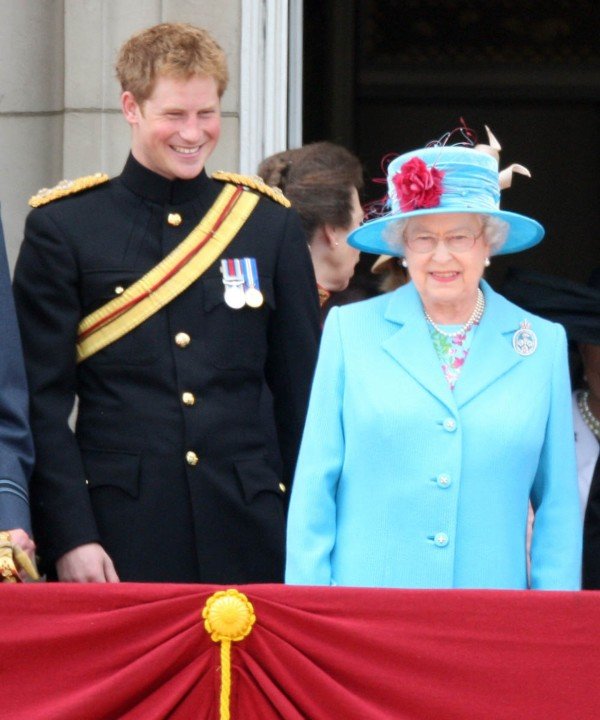 Prince Harry, Laughs next to HM Queen Elizabeth II