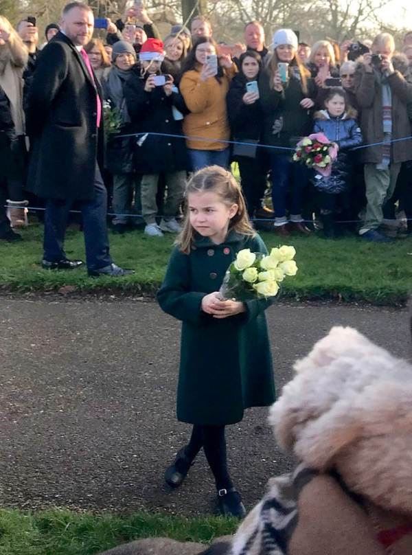 Watch Cheeky Charlotte Refusing To Give Her Flowers To A Royal Aide