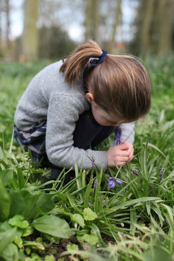 Princess Charlotte smelling flower