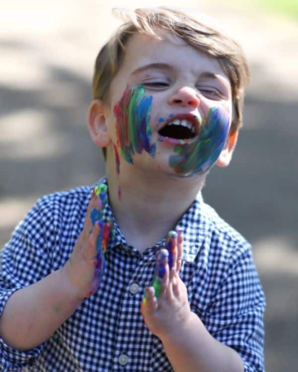 Kensington Palace released new photo of Prince Louis mearing rainbow paint across his cheeks to mark his second birthday