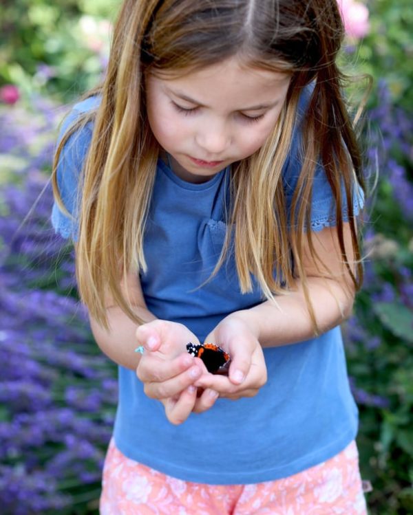 Princess Charlotte Cradles Butterfly In New Unseen Photo