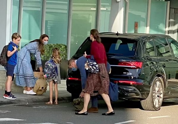 Prince William and Kate Middleton are spotted outside Heathrow Airport with their children