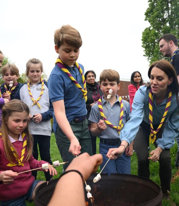 Prince George, 9, Princess Charlotte, 8, and Prince Louis, 5, joined the Scouts to renovate their Scout Hut, taking part in plating, sanding and painting.
